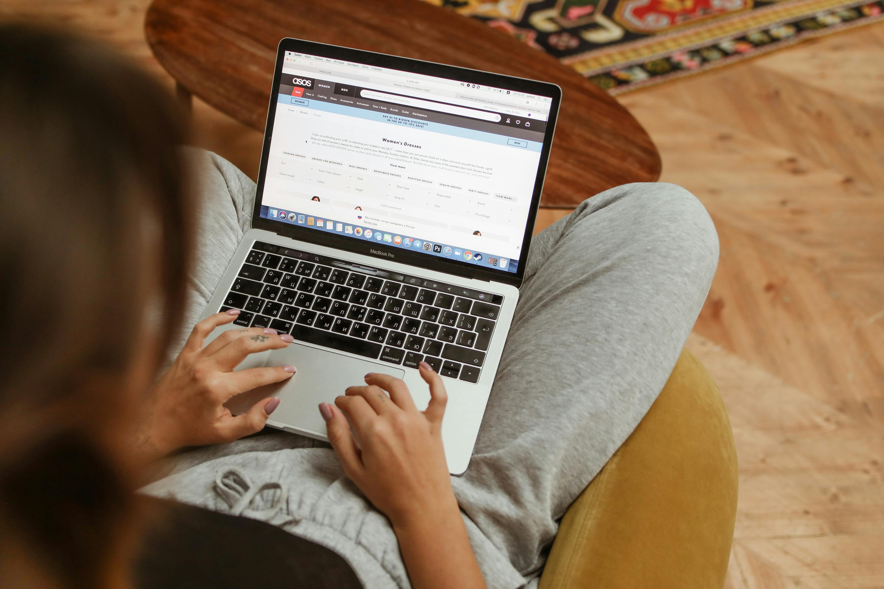 A woman working at a laptop